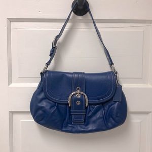 Bright blue coach handbag gently used no marks or scratches.